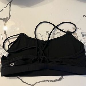 New with tags lululemon “make a move bra” sports bra. Black. Size 8